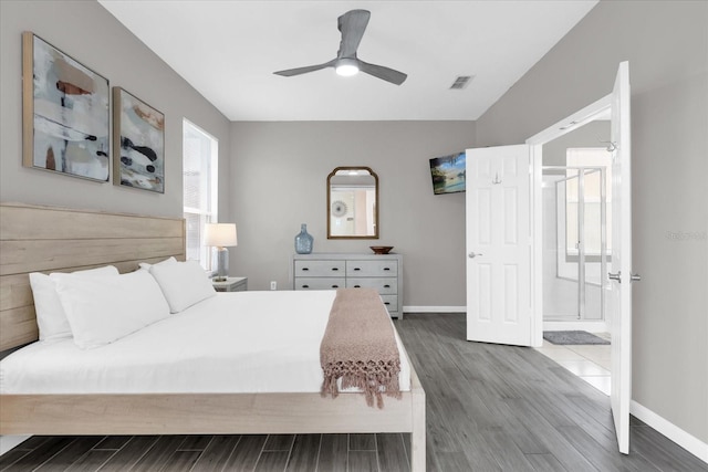 bedroom with ceiling fan and hardwood / wood-style floors