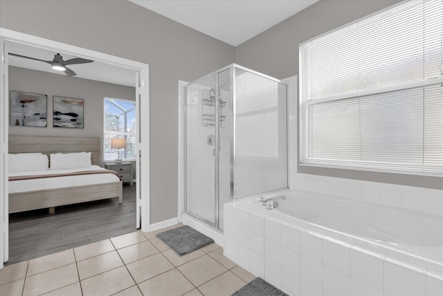 bathroom with separate shower and tub, tile patterned flooring, and ceiling fan