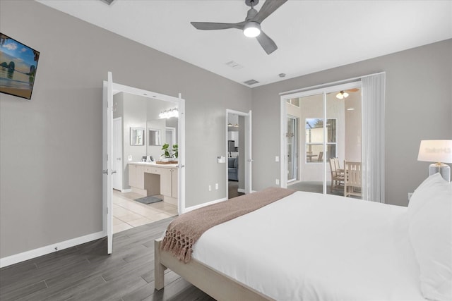 bedroom featuring ceiling fan and ensuite bath