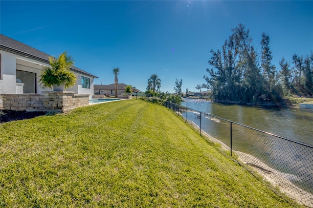 view of yard with a water view