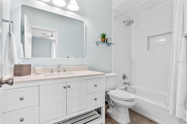 full bathroom with ceiling fan, toilet, vanity, and shower / tub combo