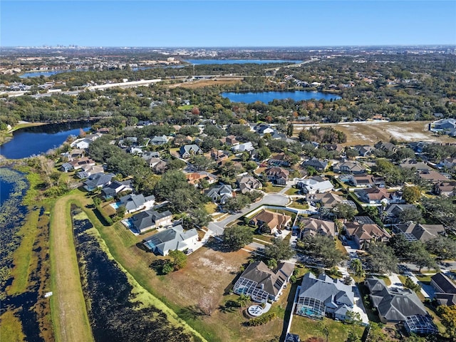 drone / aerial view with a water view