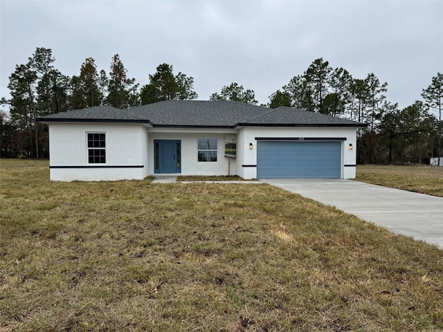 ranch-style home with a garage and a front yard