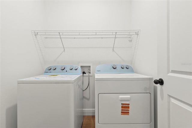 clothes washing area featuring washing machine and dryer