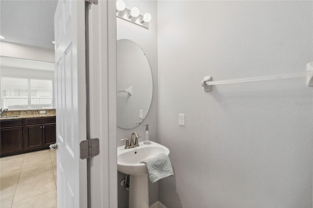 bathroom featuring sink and tile patterned floors