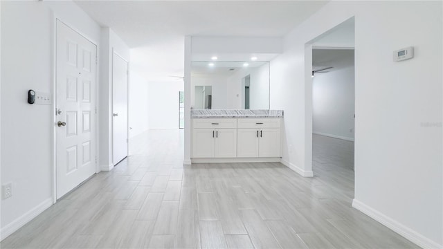 hall featuring light wood-type flooring