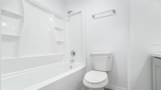 full bathroom with vanity, toilet, and washtub / shower combination