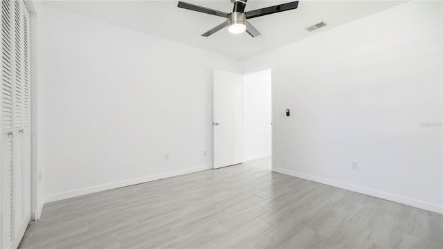 unfurnished bedroom featuring light hardwood / wood-style floors and ceiling fan