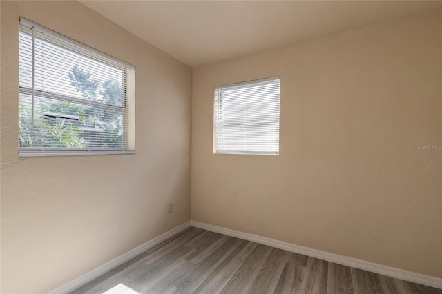 unfurnished room featuring light hardwood / wood-style floors