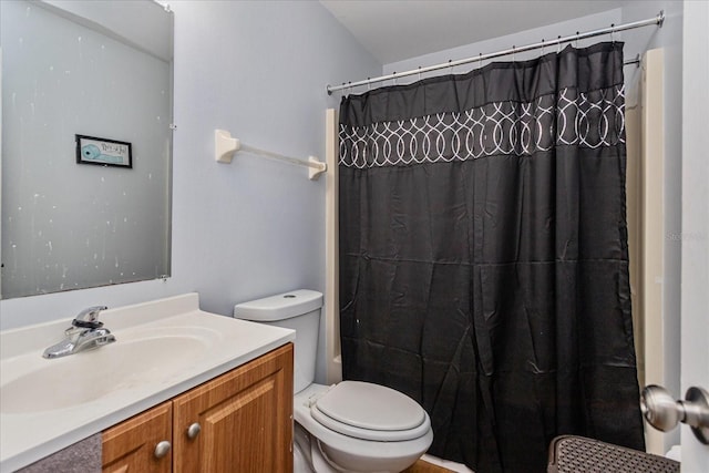 full bathroom featuring toilet, vanity, and shower / bath combo