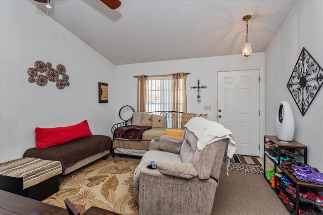 carpeted living room with lofted ceiling, ceiling fan, and a textured ceiling