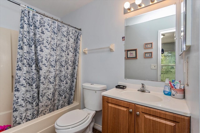 full bathroom featuring toilet, vanity, and shower / bath combination with curtain