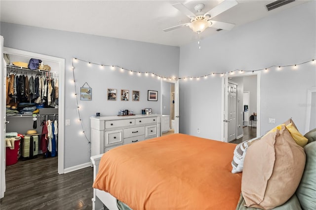 bedroom with ceiling fan, a closet, and dark hardwood / wood-style flooring