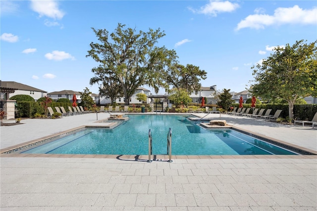 view of pool with a patio