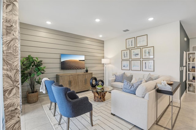 tiled living room with wood walls