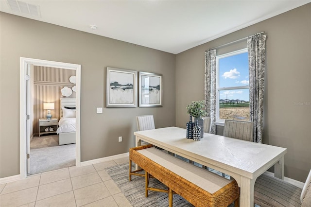 dining room featuring light tile patterned floors