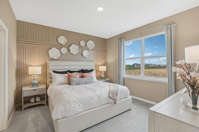 bedroom featuring light colored carpet