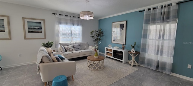 living room featuring crown molding