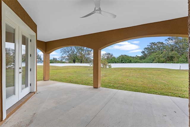 view of patio featuring french doors and ceiling fan