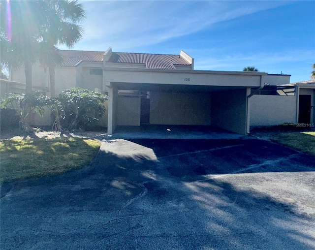 garage with a carport