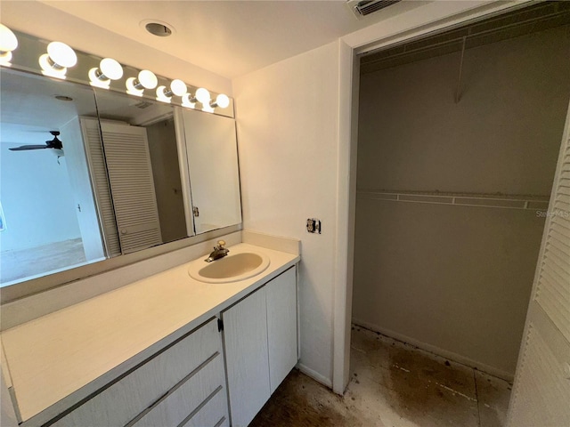 bathroom featuring ceiling fan and vanity