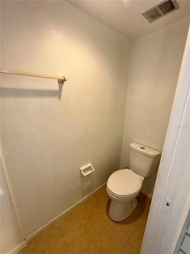 bathroom featuring toilet