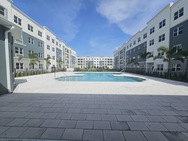 view of swimming pool featuring a patio