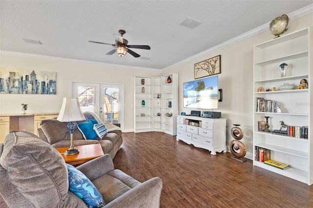 living room featuring french doors, ornamental molding, dark wood-type flooring, and a textured ceiling