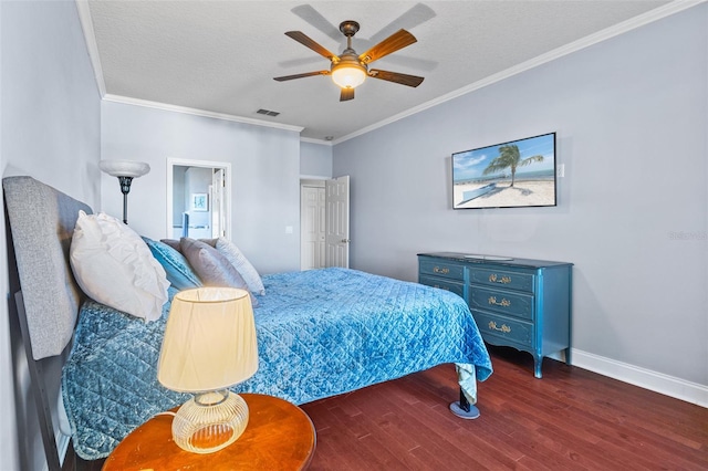 bedroom featuring ceiling fan, ornamental molding, dark hardwood / wood-style floors, and a textured ceiling