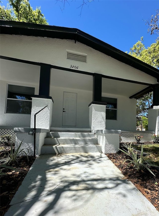 3206 N 29th St, Tampa, FL 33605 - entrance to property with stucco siding