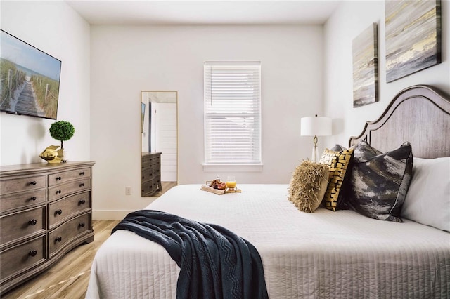 bedroom featuring light wood-type flooring