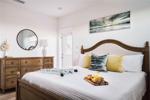 bedroom with light hardwood / wood-style flooring