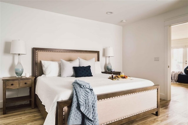 bedroom featuring wood-type flooring