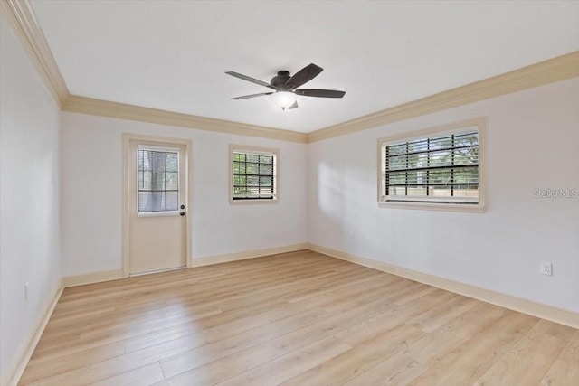 empty room with ceiling fan, light wood-type flooring, and ornamental molding