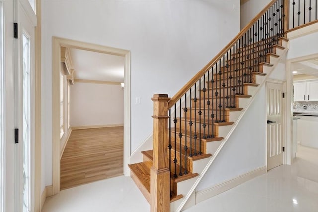 staircase with tile patterned flooring