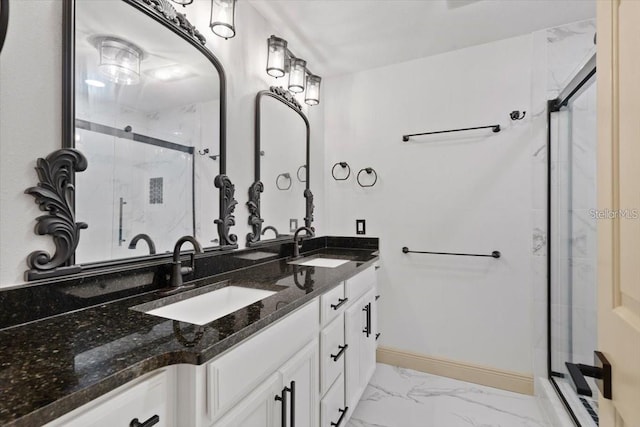 bathroom with an enclosed shower and vanity