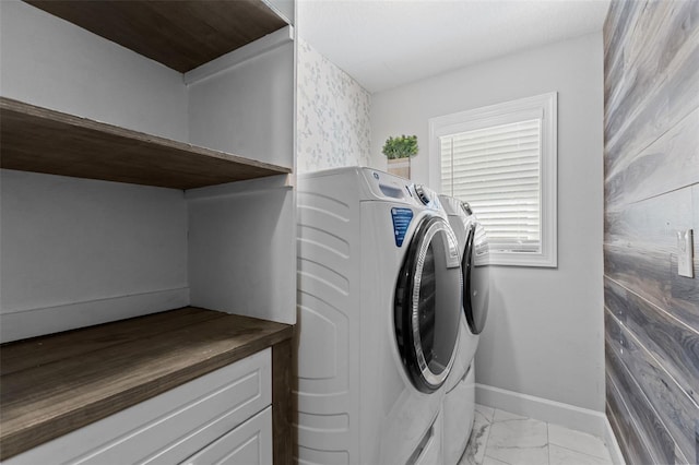 laundry area with washer and clothes dryer