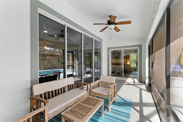 sunroom / solarium with lofted ceiling