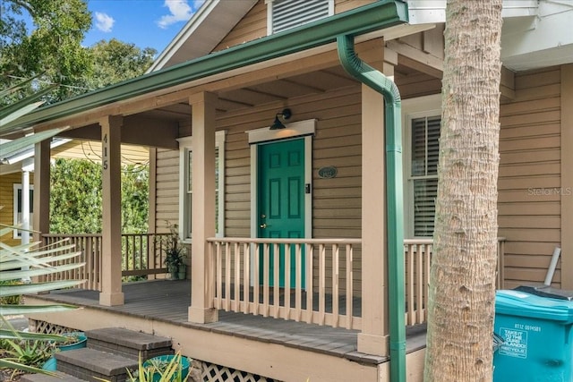 doorway to property featuring a porch