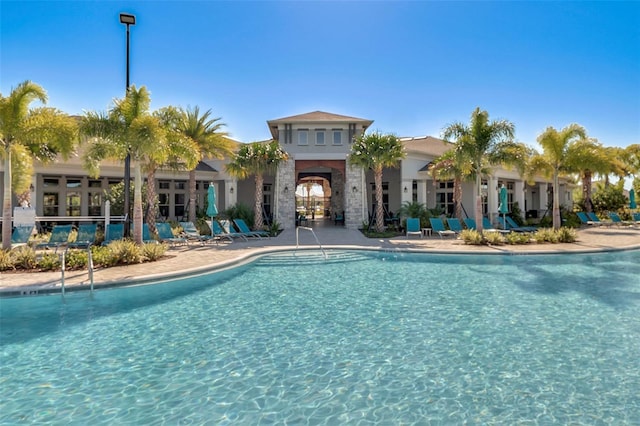 view of swimming pool with a patio area