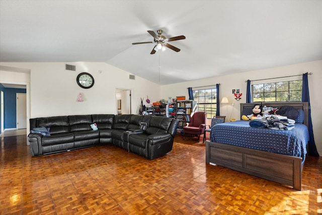 bedroom with visible vents, vaulted ceiling, and ceiling fan