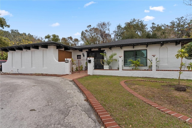 view of front of house with a front yard