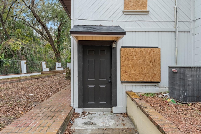 property entrance with central air condition unit