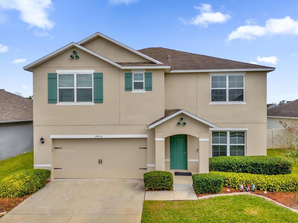 view of front of home featuring a garage