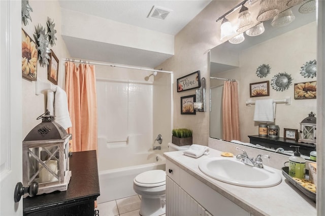 full bathroom featuring tile patterned floors, vanity, shower / tub combo, and toilet