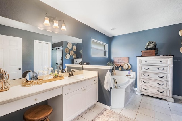 bathroom featuring vanity, independent shower and bath, and tile patterned flooring