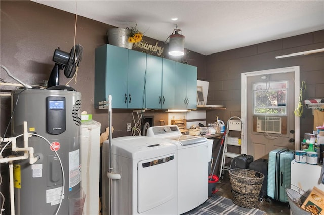 washroom featuring cabinets, cooling unit, independent washer and dryer, and heat pump water heater