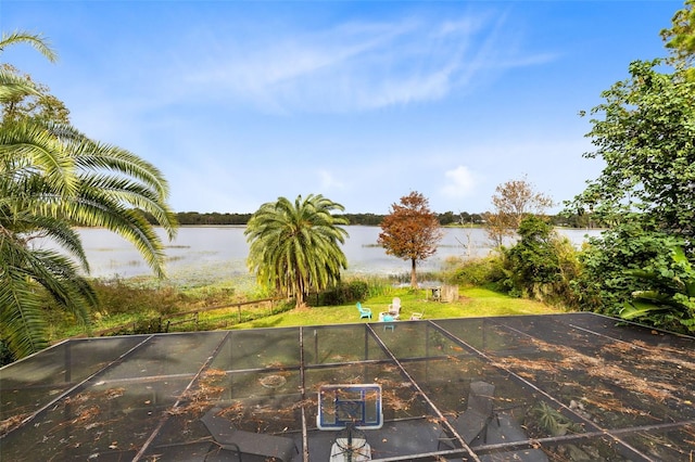 view of patio with a water view