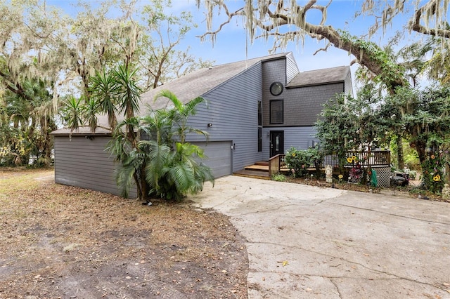 exterior space with a garage