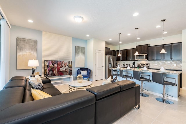 living room featuring light tile patterned floors